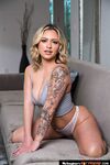 Tattooed Bombshell Gypsy Rose Plays With Her Tight Pussy On The Couch photos (Ryan Mclane)