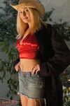 Big Breasted Blonde Cowgirl Leola Jossi Takes Off Her Red Top And Blue Skirt