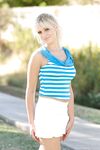 Blonde Filly Nikita Love In White Skirt And Blue Top Shows Her Big Tits And Cute Pussy Outdoors