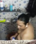 Son capture his mom bathing pic