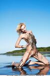 Shaved Pussy Blonde Jody Nubiles Shows Off Her Skinny Mud Covered Body On A Deserted Beach