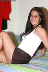 Laughing Brunette Amateur Kasey Kox Removes Her Skirt, Top And Lingerie photos (Kacey Kox)