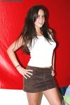 Laughing Brunette Amateur Kasey Kox Removes Her Skirt, Top And Lingerie photos (Kacey Kox)