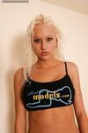Amateur Chick Lux Kassidy With White Curls Enthusiastically Shows Her Firm Boobs