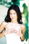 Teenage Asian Girl Kitty Jung In Snow White Dress Displays Her Sexy Oriental Slit