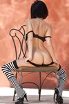Bosomy Brunette Girl Jaime Hammer Has Her Legs Wrapped In Striped Stockings