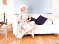 Filthy Mature Lady Hazel May Stuffs A Huge Cucumber Into Her Hole When She Stays In Her Lingerie