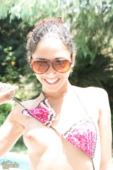 Sunglassed Latina Girl MiMi Allen Takes Off Her Bikini And Poses Nude In The Pool
