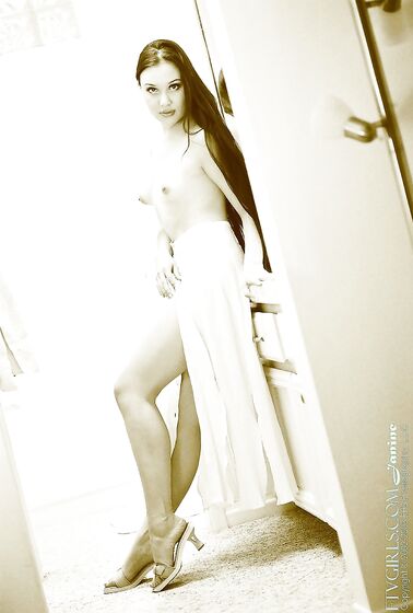 Stretching Across The Bathroom Floor, Deja Chan Lifts Her Legs High Into The Air To Give Intimacy.