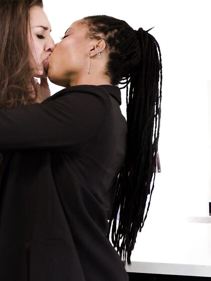 Kira Noir And Bella Rolland Pleasuring Each Other On The Table