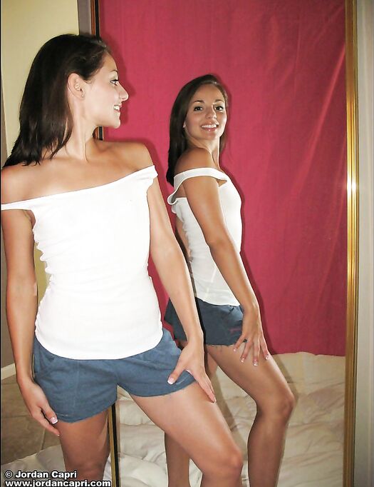 Tight Bodied Sweetheart Jordan Capri Drawing Her Clothes Off In The Mirror.